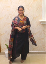 Charvi Ajrakh Printed Mirror Work Kurta Set.